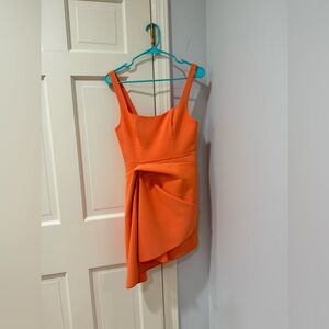 Packer size 4 soft orange cocktail/formal dress, needs dry cleaning